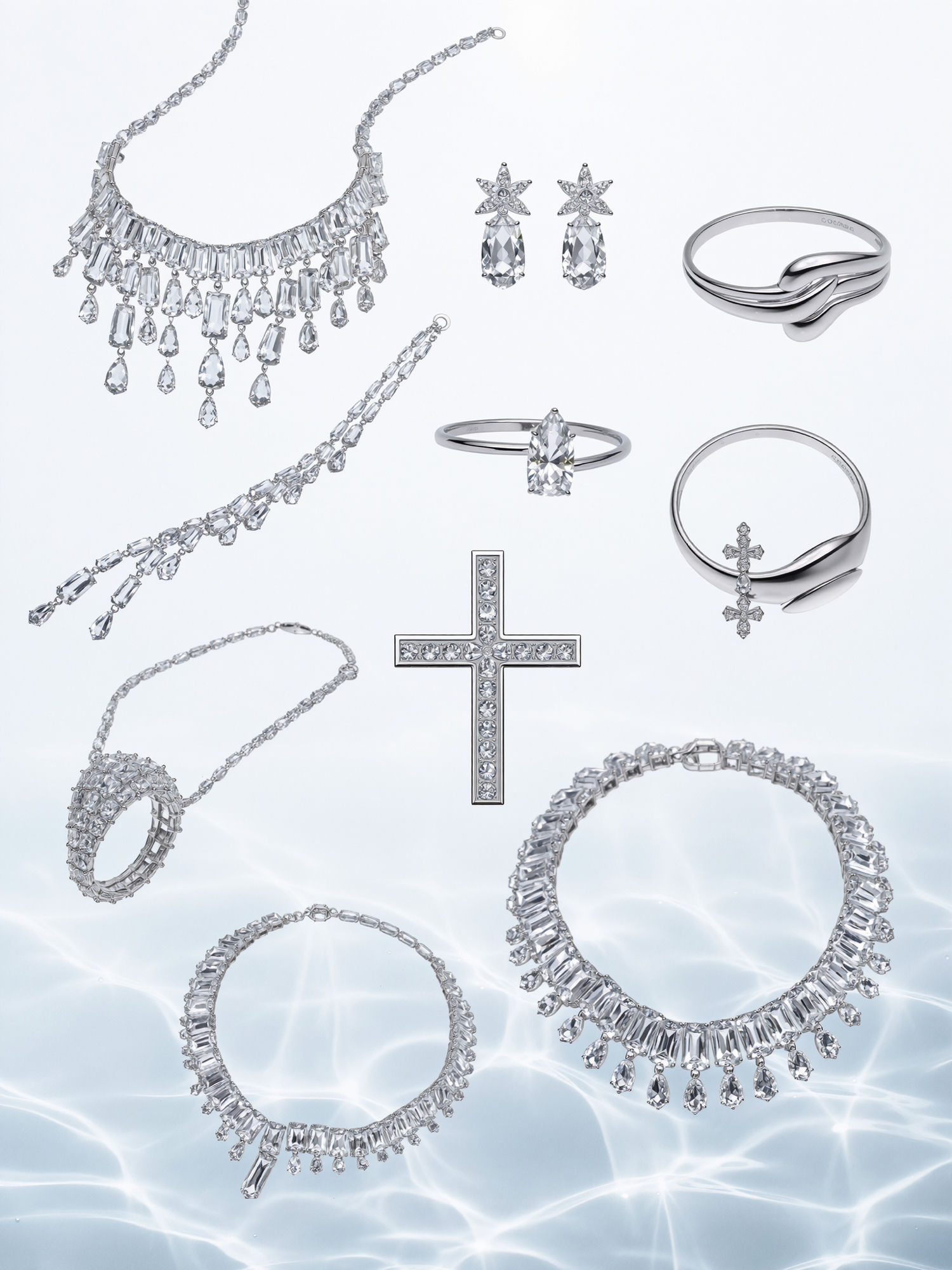 Jewelry collection flat lay on water-lit background